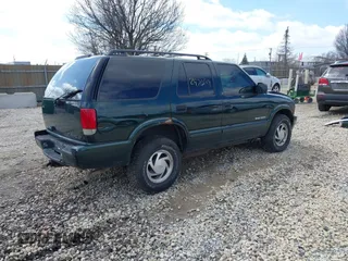 2003 Chevrolet Blazer LS z VIN 1GNDT13X93K177170, wystawiony jako IAAI lot #41839837 z przebiegiem 148 555 mil mil oraz . Historia ofert i sprzedaży dostępna na DreamBid. Obrazek 4.
