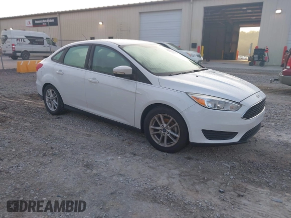 2016 Ford Focus SE z VIN 1FADP3F22GL355984, wystawiony jako IAAI lot #42564516 z przebiegiem 128 002 mil mil oraz . Historia ofert i sprzedaży dostępna na DreamBid. Obrazek 1.