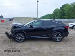 2016 Lexus RX 350 z VIN 2T2ZZMCA8GC005158, wystawiony jako IAAI lot #42105589 z przebiegiem 125 337 mil mil oraz . Historia ofert i sprzedaży dostępna na DreamBid. Obrazek 13.