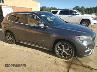 2016 BMW X1 xDrive28i z VIN WBXHT3Z30G4A47563, wystawiony jako Copart lot #50252555 z przebiegiem 99 975 mil mil oraz Szkoda całkowita • Salvage title. Historia ofert i sprzedaży dostępna na DreamBid. Obrazek 4.