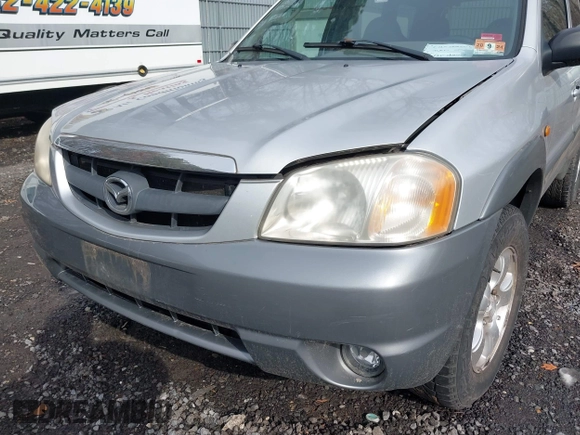 2001 Mazda Tribute LX with VIN 4F2YU08151KM06561, listed as a IAAI auction lot 41478779 with 54,826 mi miles and . Bid and sale history available at DreamBid. Image 6.