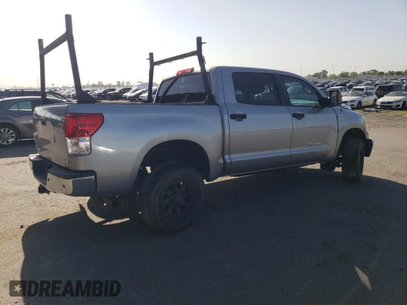2013 Toyota Tundra с VIN 5TFDY5F10DX284847, выставлен на аукционе Copart как лот 52356135 с пробегом 80 774 миль миль и Списание • Salvage title. История ставок и продаж доступна на DreamBid. Изображение 3.