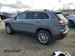 2021 Jeep Cherokee 80th Anniversary with VIN 1C4PJMMX9MD233738, listed as a Copart auction lot 49643365 with 10,096 mi miles and Salvage Title. Bid and sale history available at carsss.com. Image 2.