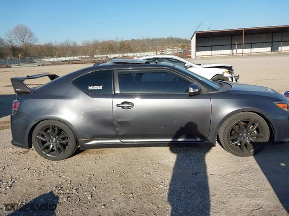 2014 Scion tC with VIN JTKJF5C74E3083312, listed as a IAAI auction lot 41730086 with 118,124 mi miles. Bid and sale history available at carsss.com. Image 13.