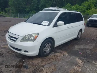 2005 Honda Odyssey EX-L with VIN 5FNRL38705B085917, listed as a IAAI auction lot 42210776 with 296,056 mi miles. Bid and sale history available at carsss.com. Image 2.