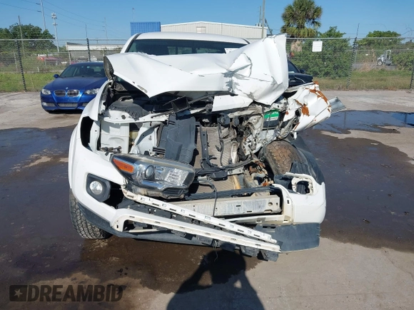 2017 Toyota Tacoma SR5 with VIN 5TFAZ5CNXHX044976, listed as a IAAI auction lot 42052922 with 149,116 mi miles and . Bid and sale history available at DreamBid. Image 12.