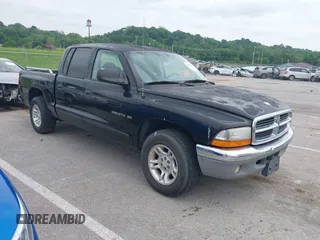 2001 Dodge Dakota Sport z VIN 1B7HL2AN11S314794, wystawiony jako IAAI lot #42280339 z przebiegiem 180 239 mil mil oraz . Historia ofert i sprzedaży dostępna na DreamBid. Obrazek 1.