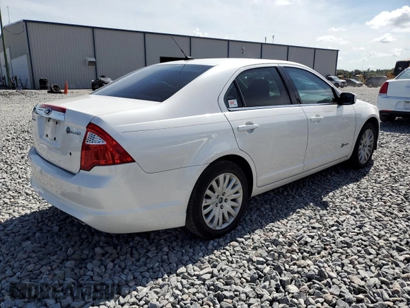 2010 Ford Fusion Hybrid с VIN 3FADP0L3XAR142883, выставлен на аукционе Copart как лот 64308015 с пробегом 67 890 миль миль и Чистый • Clean title. История ставок и продаж доступна на DreamBid. Изображение 3.