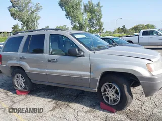 2004 Jeep Grand Cherokee Laredo with VIN 1J4GX48N24C334983, listed as a IAAI auction lot 42522088 with 169,793 mi miles and . Bid and sale history available at DreamBid. Image 6.