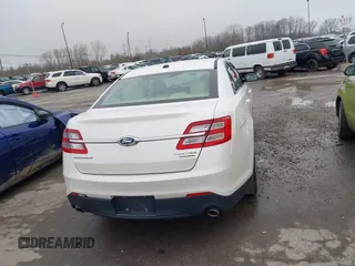 2015 Ford Taurus Limited with VIN 1FAHP2F85FG117635, listed as a IAAI auction lot 41979311 with 104,314 mi miles. Bid and sale history available at carsss.com. Image 17.