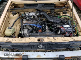 1979 Volkswagen Rabbit z VIN 1793801579, wystawiony jako Copart lot #89217815 z przebiegiem 13 577 mil mil oraz Tytuł czysty. Historia ofert i sprzedaży dostępna na DreamBid. Obrazek 11.