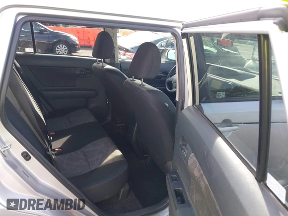 2015 Scion xB with VIN JTLZE4FE7FJ073828, listed as a IAAI auction lot 41857967 with 56,242 mi miles. Bid and sale history available at carsss.com. Image 8.
