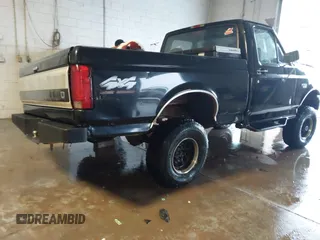 1996 Ford F-150 with VIN 1FTEF14H8TLB38284, listed as a IAAI auction lot 41236907 with 175,998 mi miles. Bid and sale history available at carsss.com. Image 4.