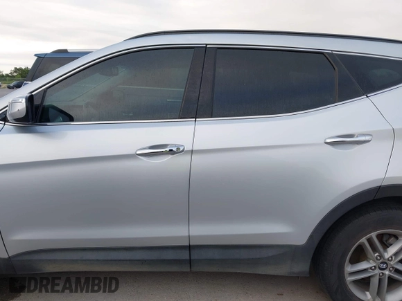 2017 Hyundai Santa Fe 2.4L with VIN 5XYZU3LB4HG464876, listed as a IAAI auction lot 42693100 with 127,888 mi miles and . Bid and sale history available at DreamBid. Image 14.