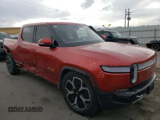 2023 Rivian R1T Adventure with VIN 7FCTGAAA2PN026211, listed as a Copart auction lot 77705414 with Not Provided miles and Salvage Title. Bid and sale history available at DreamBid. Image 4.