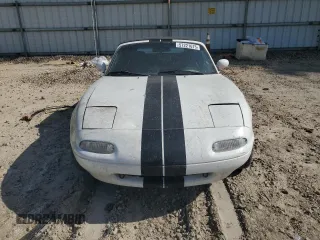 1991 Mazda MX-5 Miata Special Edition z VIN JM1NA3515M0231262, wystawiony jako Copart lot #57221675 z przebiegiem 241 670 mil mil oraz Szkoda całkowita • Salvage title. Historia ofert i sprzedaży dostępna na DreamBid. Obrazek 5.