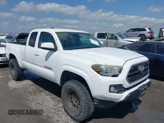 2018 Toyota Tacoma SR z VIN 5TFRX5GN8JX109283, wystawiony jako IAAI lot #42038937 z przebiegiem 124 431 mil mil oraz . Historia ofert i sprzedaży dostępna na DreamBid. Obrazek 1.