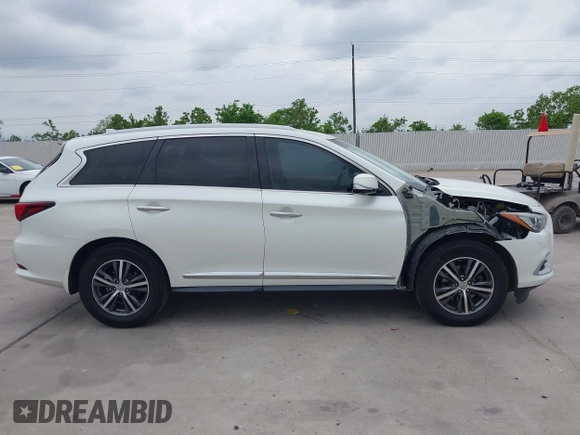 2016 Infiniti QX60 with VIN 5N1AL0MNXGC532149, listed as a IAAI auction lot 42034650 with 124,126 mi miles and . Bid and sale history available at DreamBid. Image 13.