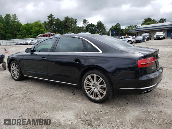 2015 Audi A8 4.0T with VIN WAU32AFD6FN013982, listed as a Copart auction lot 58122294 with 100,981 mi miles and Clean title. Bid and sale history available at DreamBid. Image 2.
