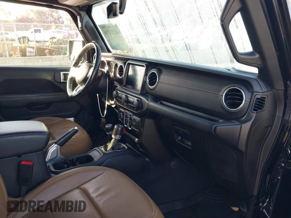 2020 Jeep Gladiator Overland with VIN 1C6HJTFG7LL139980, listed as a IAAI auction lot 40713794 with 33,560 mi miles and . Bid and sale history available at DreamBid. Image 5.