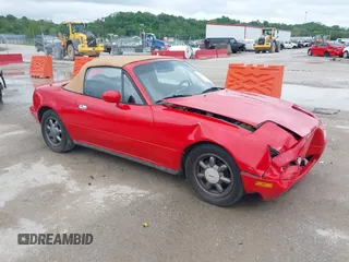 1990 Mazda MX-5 Miata z VIN JM1NA3516L0113719, wystawiony jako IAAI lot #42158181 z przebiegiem 200 357 mil mil oraz . Historia ofert i sprzedaży dostępna na DreamBid. Obrazek 1.