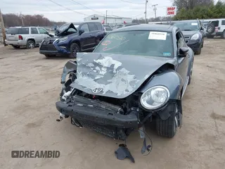 2012 Volkswagen Beetle with VIN 3VWV67AT0CM663718, listed as a IAAI auction lot 41860510 with 99,932 mi miles and . Bid and sale history available at DreamBid. Image 2.