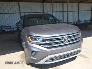 2021 Volkswagen Atlas SE z VIN 1V2JC2CAXMC200432, wystawiony jako IAAI lot #41761342 z przebiegiem 71 743 mil mil oraz . Historia ofert i sprzedaży dostępna na DreamBid. Obrazek 1.