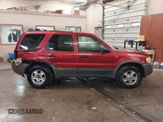 2001 Ford Escape XLT with VIN 1FMYU04101KF46809, listed as a IAAI auction lot 41664202 with 256,468 mi miles. Bid and sale history available at carsss.com. Image 13.