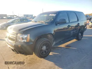 2011 Chevrolet Tahoe Commercial with VIN 1GNLC2E08BR139033, listed as a Copart auction lot 79742124 with 186,858 mi miles and Salvage title. Bid and sale history available at DreamBid. Image 1.