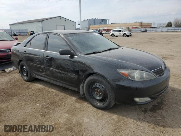 2004 Toyota Camry LE with VIN JTDBE32K940288536, listed as a Copart auction lot 54106555 with 246,661 mi miles and Clean Title. Bid and sale history available at DreamBid. Image 4.