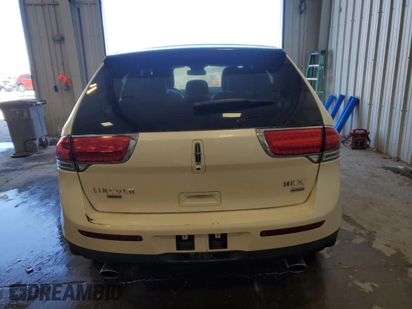 2011 Lincoln MKX z VIN 2LMDJ8JK4BBJ31821, wystawiony jako Copart lot #52150815 z przebiegiem 125 597 mil mil oraz Nie do naprawy • Non repairable. Historia ofert i sprzedaży dostępna na DreamBid. Obrazek 6.