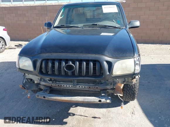 2002 Toyota Tacoma z VIN 5TENL42N92Z064523, wystawiony jako IAAI lot #42228845 z przebiegiem 305 172 mil mil oraz . Historia ofert i sprzedaży dostępna na DreamBid. Obrazek 6.