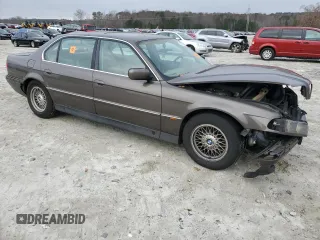 1997 BMW 7 Series 740il with VIN WBAGJ8325VDM01757, listed as a Copart auction lot 85734614 with 190,453 mi miles and Non Repairable. Bid and sale history available at carsss.com. Image 4.