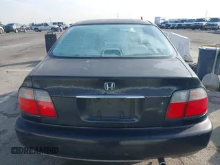 1997 Honda Accord z VIN 1HGTB5622VA476216, wystawiony jako IAAI lot #41407716 z przebiegiem 285 385 mil mil oraz . Historia ofert i sprzedaży dostępna na DreamBid. Obrazek 16.