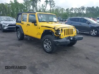 2015 Jeep Wrangler Unlimited Willys Wheeler with VIN 1C4BJWDG2FL643375, listed as a IAAI auction lot 42109724 with 112,357 mi miles and . Bid and sale history available at DreamBid. Image 1.