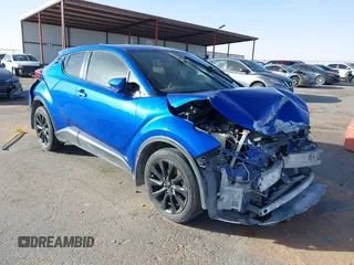 2019 Toyota C-HR XLE with VIN NMTKHMBX3KR098510, listed as a IAAI auction lot 41289899 with 112,981 mi miles. Bid and sale history available at carsss.com. Image 1.