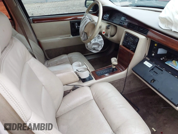 1994 Cadillac Seville STS z VIN 1G6KY5296RU823387, wystawiony jako IAAI lot #42151901 z przebiegiem 165 918 mil mil oraz . Historia ofert i sprzedaży dostępna na DreamBid. Obrazek 5.