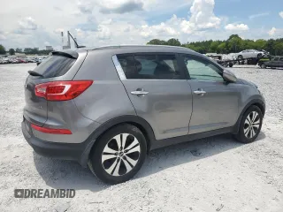 2011 Kia Sportage EX z VIN KNDPC3A23B7053471, wystawiony jako Copart lot #63685595 z przebiegiem 184 661 mil mil oraz Szkoda całkowita • Salvage title. Historia ofert i sprzedaży dostępna na DreamBid. Obrazek 3.