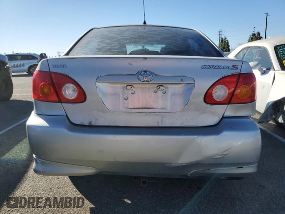 2003 Toyota Corolla CE with VIN 1NXBR32E13Z155142, listed as a Copart auction lot 79714184 with 299,999 mi miles and Salvage Title. Bid and sale history available at DreamBid. Image 6.