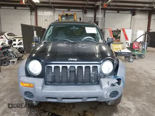 2003 Jeep Liberty Sport with VIN 1J4GL48K53W583860, listed as a IAAI auction lot 41632528 with 162,235 mi miles. Bid and sale history available at carsss.com. Image 12.