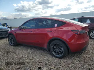 2024 Tesla Model Y Long Range z VIN 7SAYGDEE8RA302077, wystawiony jako Copart lot #52622465 z przebiegiem 11 830 mil mil oraz Szkoda całkowita • Salvage title. Historia ofert i sprzedaży dostępna na DreamBid. Obrazek 2.