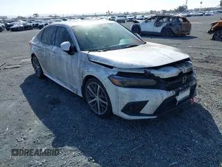 2023 Honda Civic Touring z VIN 2HGFE1F95PH308070, wystawiony jako IAAI lot #41593349 z przebiegiem Nie podano mil oraz . Historia ofert i sprzedaży dostępna na DreamBid. Obrazek 1.