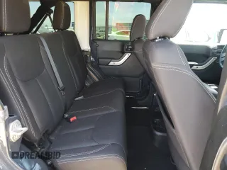 2018 Jeep Wrangler Unlimited Rubicon Recon z VIN 1C4BJWFG6JL857341, wystawiony jako Copart lot #60678185 z przebiegiem 64 115 mil mil oraz Szkoda całkowita • Salvage title. Historia ofert i sprzedaży dostępna na DreamBid. Obrazek 10.