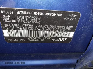2017 Mitsubishi Lancer ES with VIN JA32V2FW4HU006890, listed as a IAAI auction lot 41636035 with 165,077 mi miles. Bid and sale history available at carsss.com. Image 9.