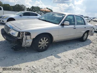 2005 Mercury Grand Marquis LS Premium with VIN 2MEHM75W75X657043, listed as a Copart auction lot 71648694 with 143,672 mi miles and Salvage Title. Bid and sale history available at carsss.com. Image 1.