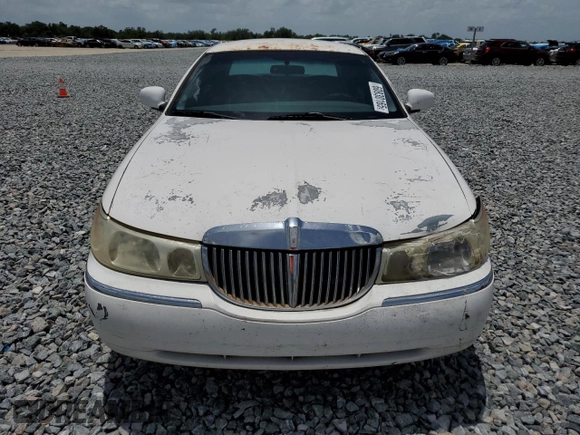 1999 Lincoln Town Car Executive z VIN 1LNHM81WXXY627319, wystawiony jako Copart lot #60830165 z przebiegiem 122 118 mil mil oraz Szkoda całkowita • Salvage title. Historia ofert i sprzedaży dostępna na DreamBid. Obrazek 5.
