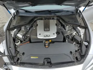 2014 Infiniti Q50 Premium z VIN JN1BV7AP3EM681014, wystawiony jako Copart lot #54339345 z przebiegiem 120 383 mil mil oraz Szkoda całkowita • Salvage title. Historia ofert i sprzedaży dostępna na DreamBid. Obrazek 11.