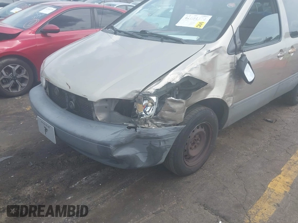 2000 Toyota Sienna LE z VIN 4T3ZF13C4YU309866, wystawiony jako IAAI lot #42184370 z przebiegiem 176 171 mil mil oraz . Historia ofert i sprzedaży dostępna na DreamBid. Obrazek 6.