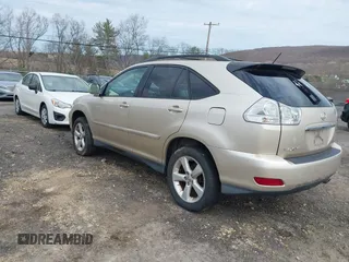 2005 Lexus RX 330 with VIN 2T2HA31U65C047755, listed as a IAAI auction lot 42043942 with 301,840 mi miles. Bid and sale history available at carsss.com. Image 3.