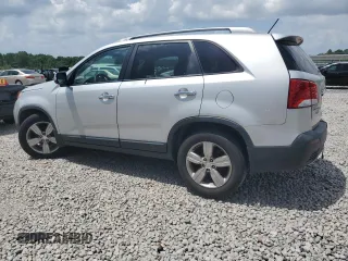 2012 Kia Sorento EX with VIN 5XYKU4A69CG288431, listed as a Copart auction lot 62986595 with 216,323 mi miles and Salvage title. Bid and sale history available at DreamBid. Image 2.